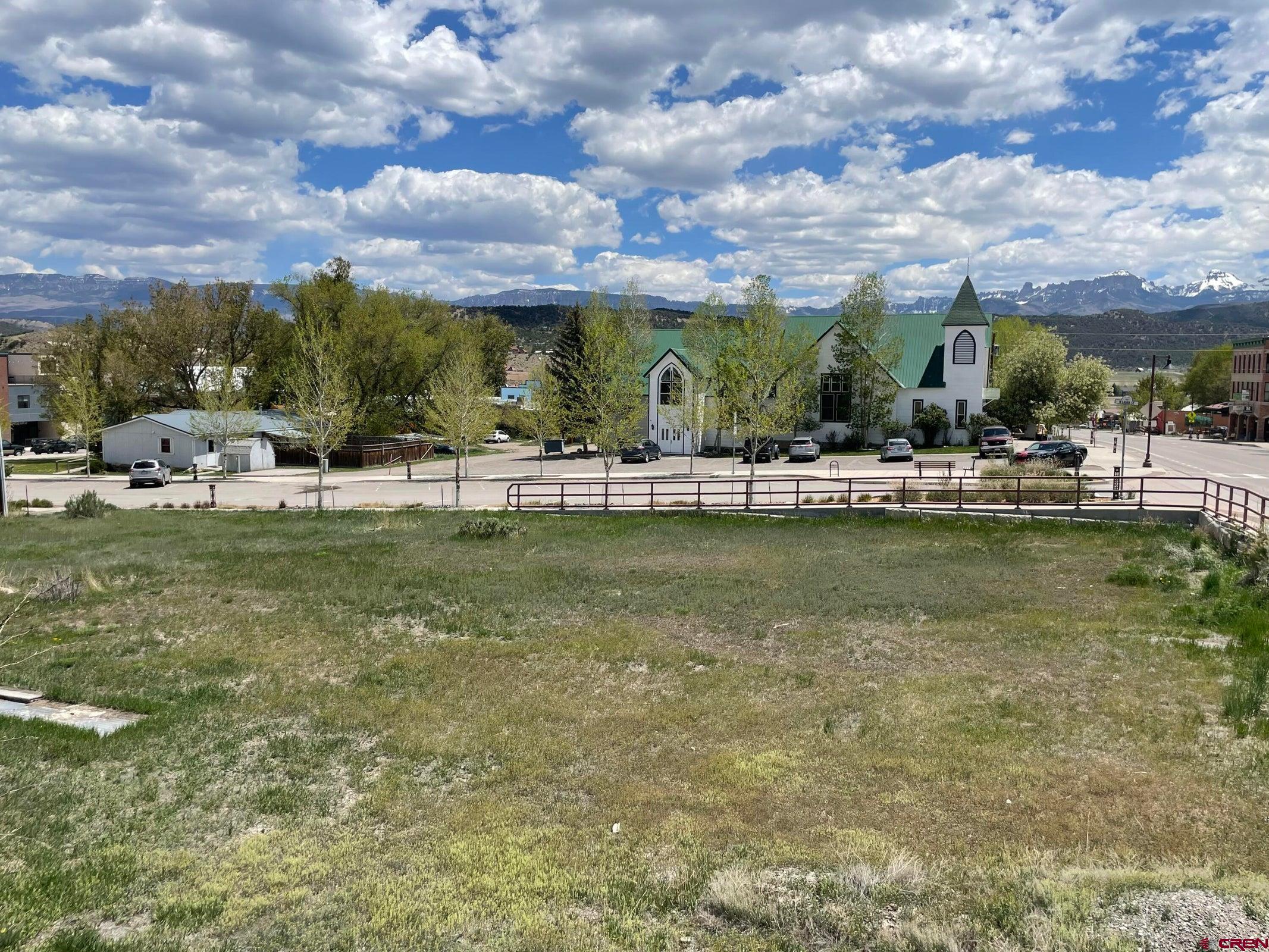 Tbd Sherman Street Ridgway, CO 81432 - Photo 2 of 2 a view of houses with outdoor space and lakeside