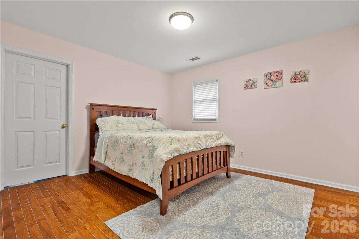 209 Fairway Road Cheraw, SC 29520 - Photo 18 of 48 a bedroom with a bed and window