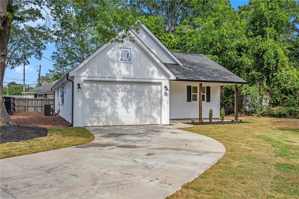 611 Graham Street Northwest Rome, GA 30165 - Photo 1 of 1 a front view of a house with a yard