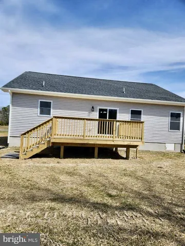a view of a house with pool and porch