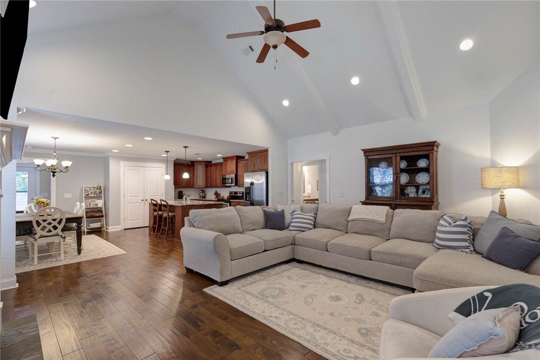 641 Deer Run Road Auburn, AL 36832 - Photo 9 of 28 This spacious open-concept living area features vaulted ceilings and rich hardwood floors.