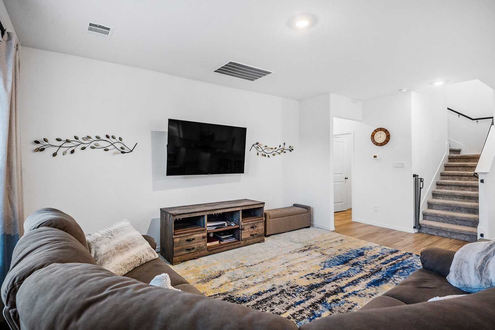 1909 Four Waters Loop Georgetown, TX 78628 - Photo 13 of 35 a bedroom with a bed and a television