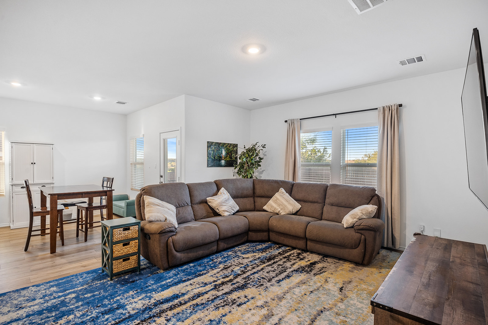 1909 Four Waters Loop Georgetown, TX 78628 - Photo 14 of 35 a living room with furniture and a wooden floor