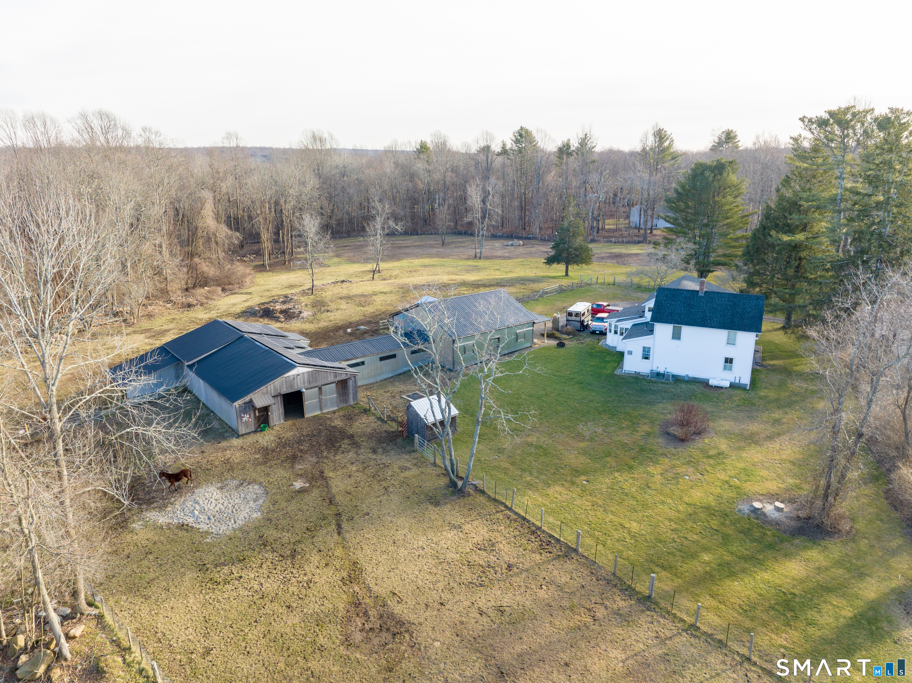 112 Schulman Veslak Road East Haddam, CT 06423 - Photo 1 of 26 a view of a swimming pool with a yard and mountain view