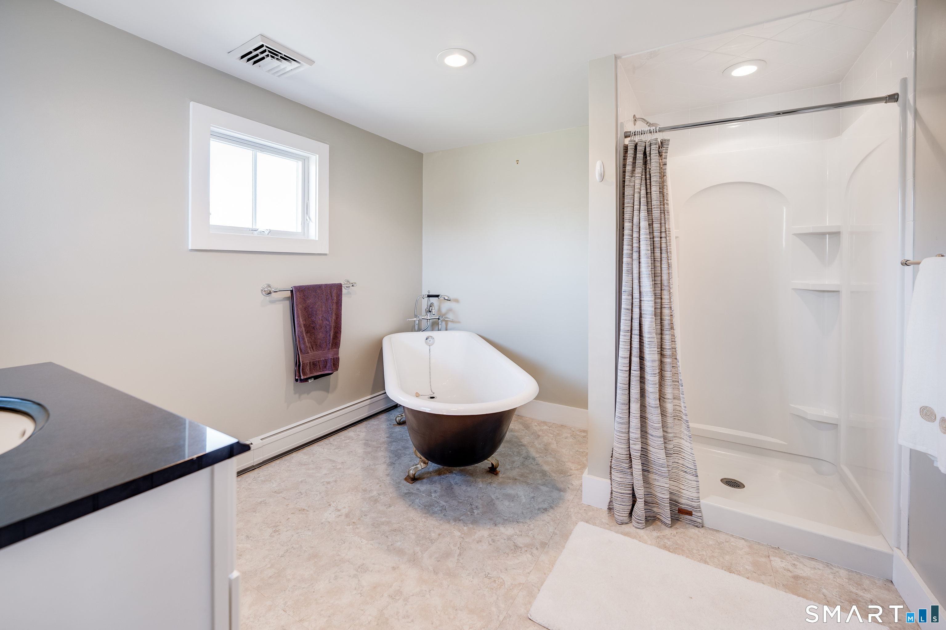 112 Schulman Veslak Road East Haddam, CT 06423 - Photo 15 of 26 a bathroom with a granite countertop sink toilet a mirror and shower