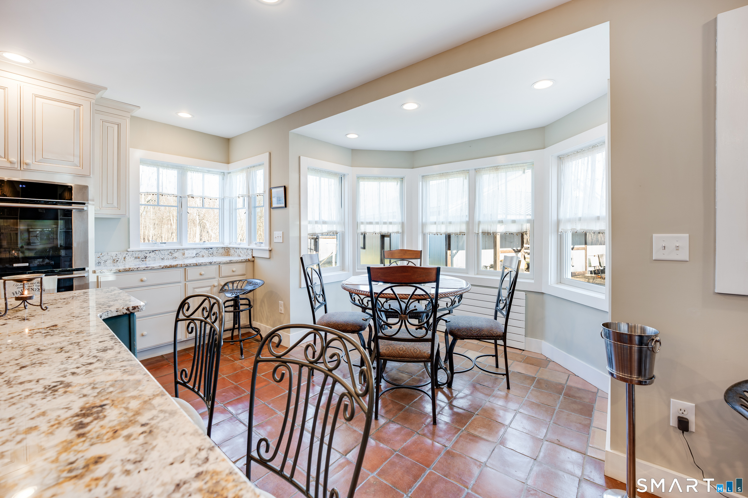 112 Schulman Veslak Road East Haddam, CT 06423 - Photo 4 of 26 a view of a dining room with furniture