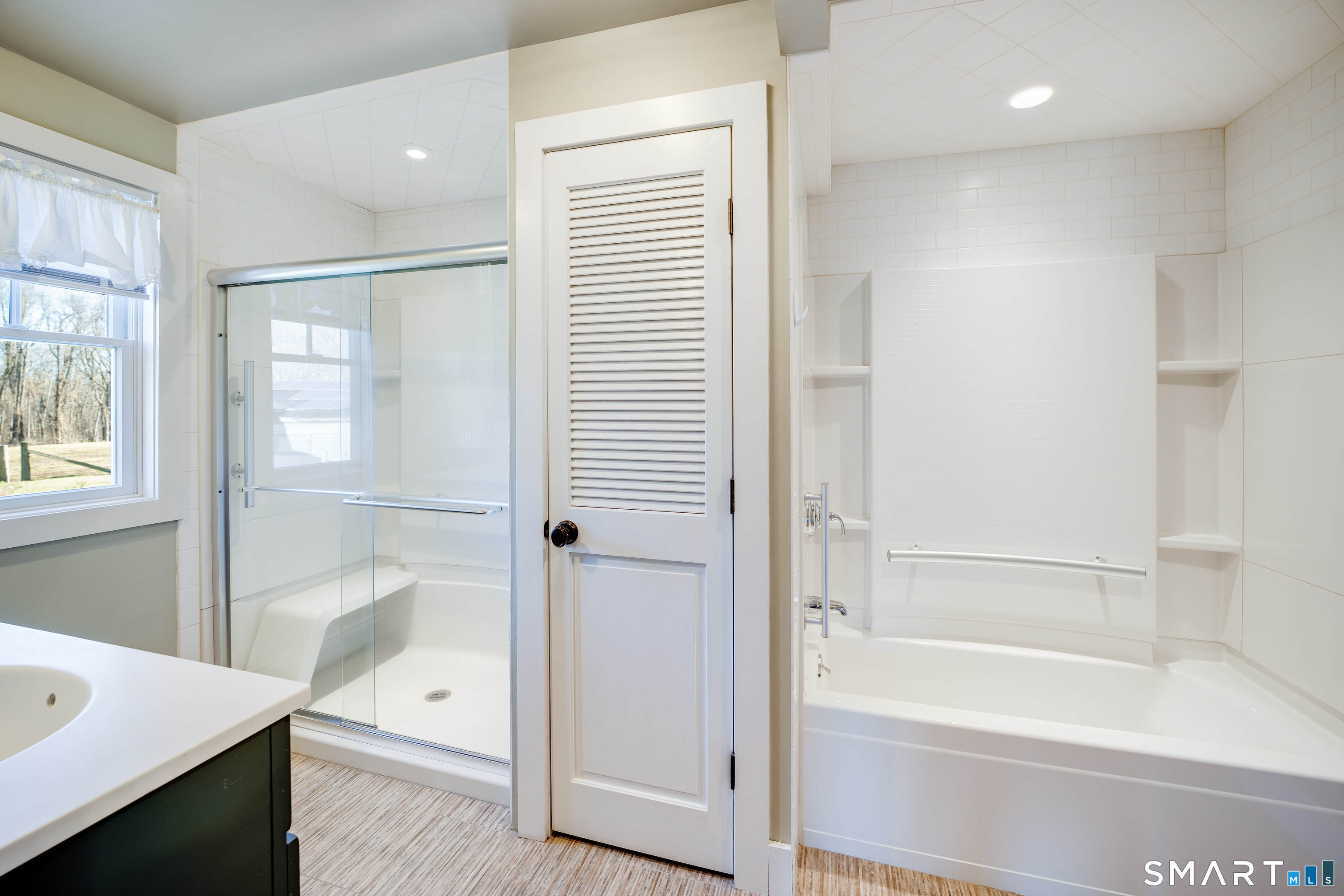 112 Schulman Veslak Road East Haddam, CT 06423 - Photo 10 of 26 a bathroom with a bathtub and a shower