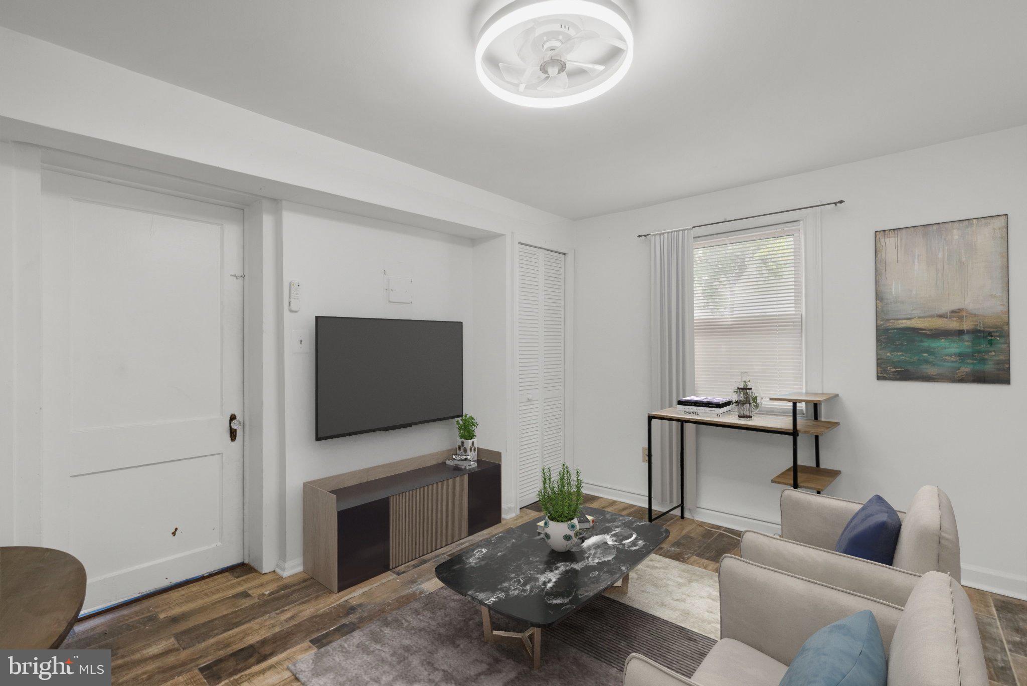 824 Philadelphia Avenue Silver Spring, MD 20910 - Photo 15 of 23 Virtual Staging: 1st Floor Rec Room