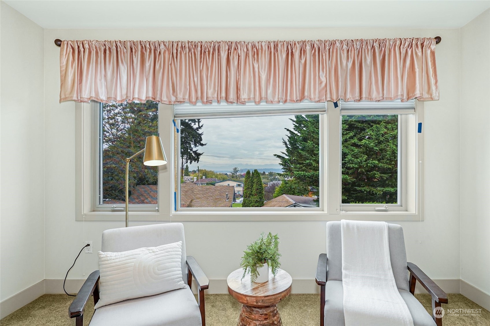 316 Walnut Street, Unit 201 Edmonds, WA 98020 - Photo 18 of 29 a view of a dining room with furniture window and outside view