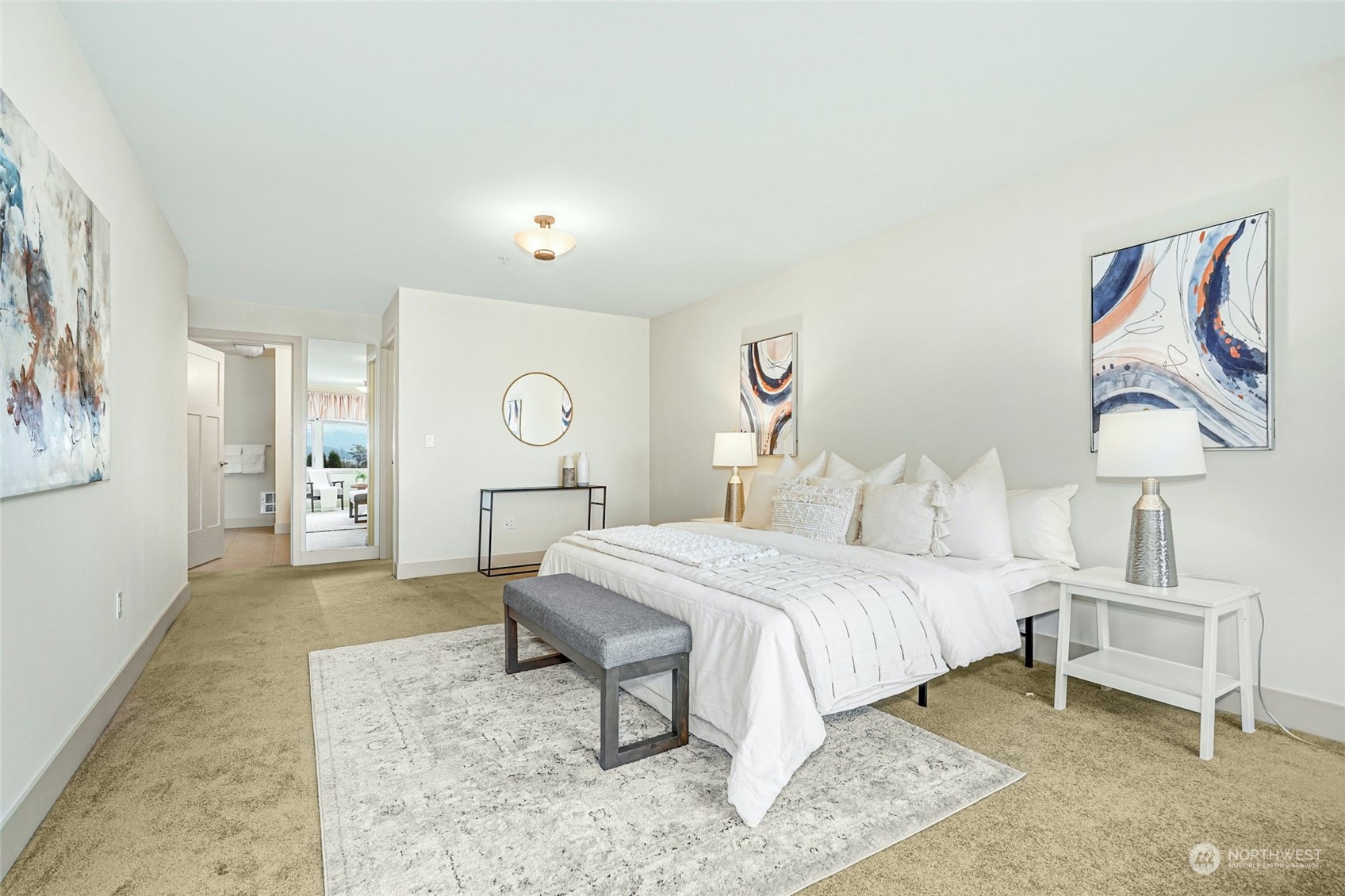 316 Walnut Street, Unit 201 Edmonds, WA 98020 - Photo 19 of 29 a bedroom with a bed and a table