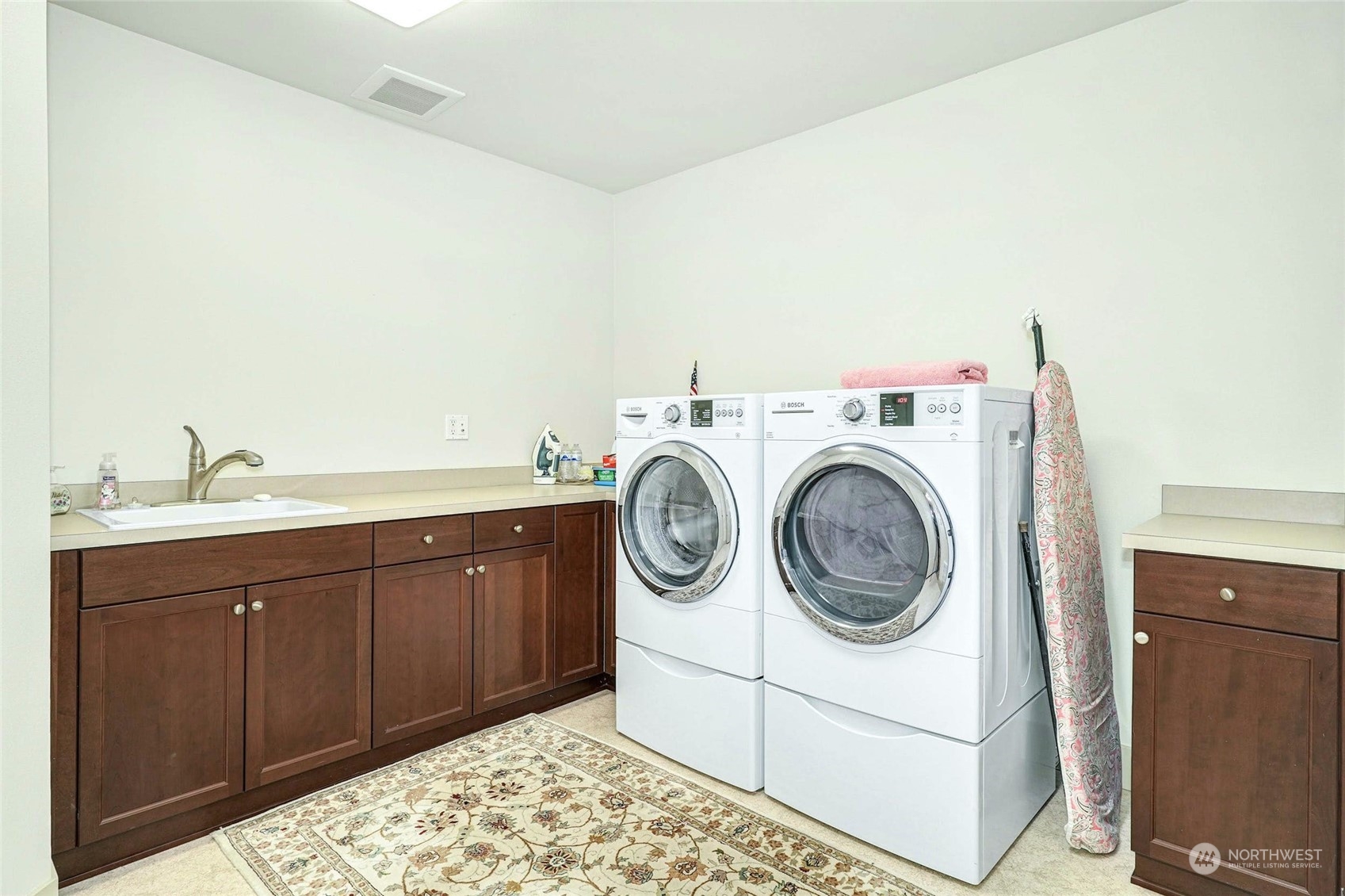 316 Walnut Street, Unit 201 Edmonds, WA 98020 - Photo 23 of 29 a utility room with sink dryer and washer
