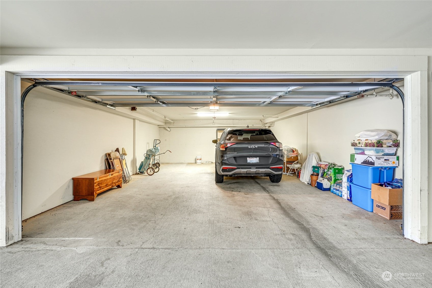 316 Walnut Street, Unit 201 Edmonds, WA 98020 - Photo 27 of 29 a view of a garage with cars
