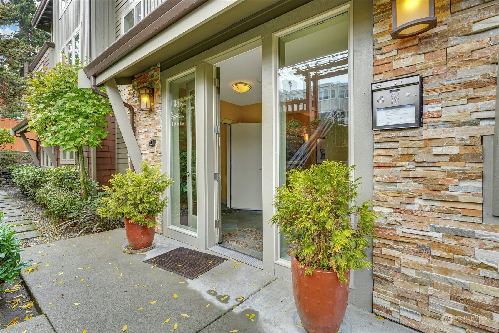 316 Walnut Street, Unit 201 Edmonds, WA 98020 - Photo 3 of 29 a view of a potted plants in front of door