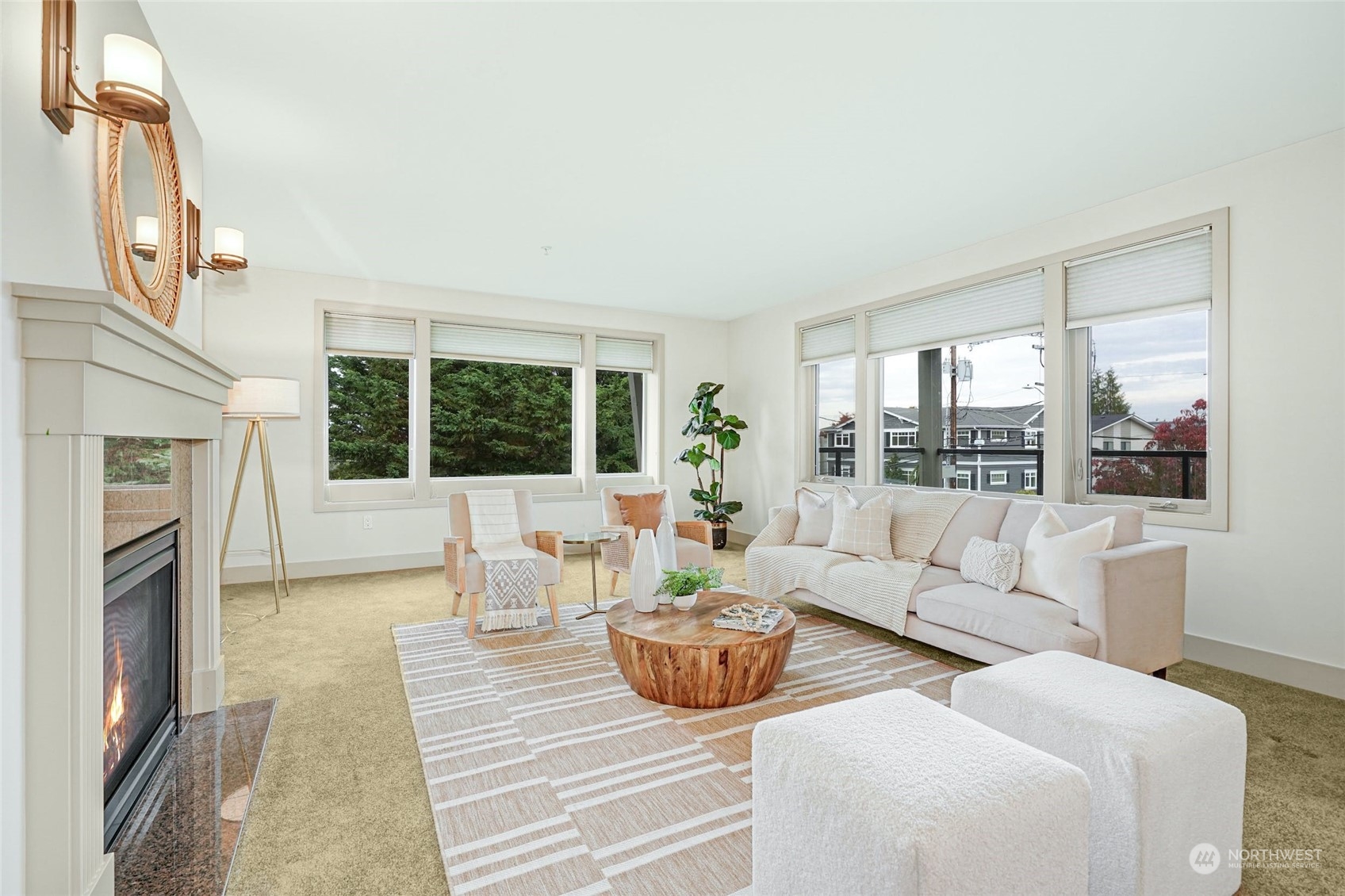 316 Walnut Street, Unit 201 Edmonds, WA 98020 - Photo 7 of 29 a living room with furniture a large window and a fireplace