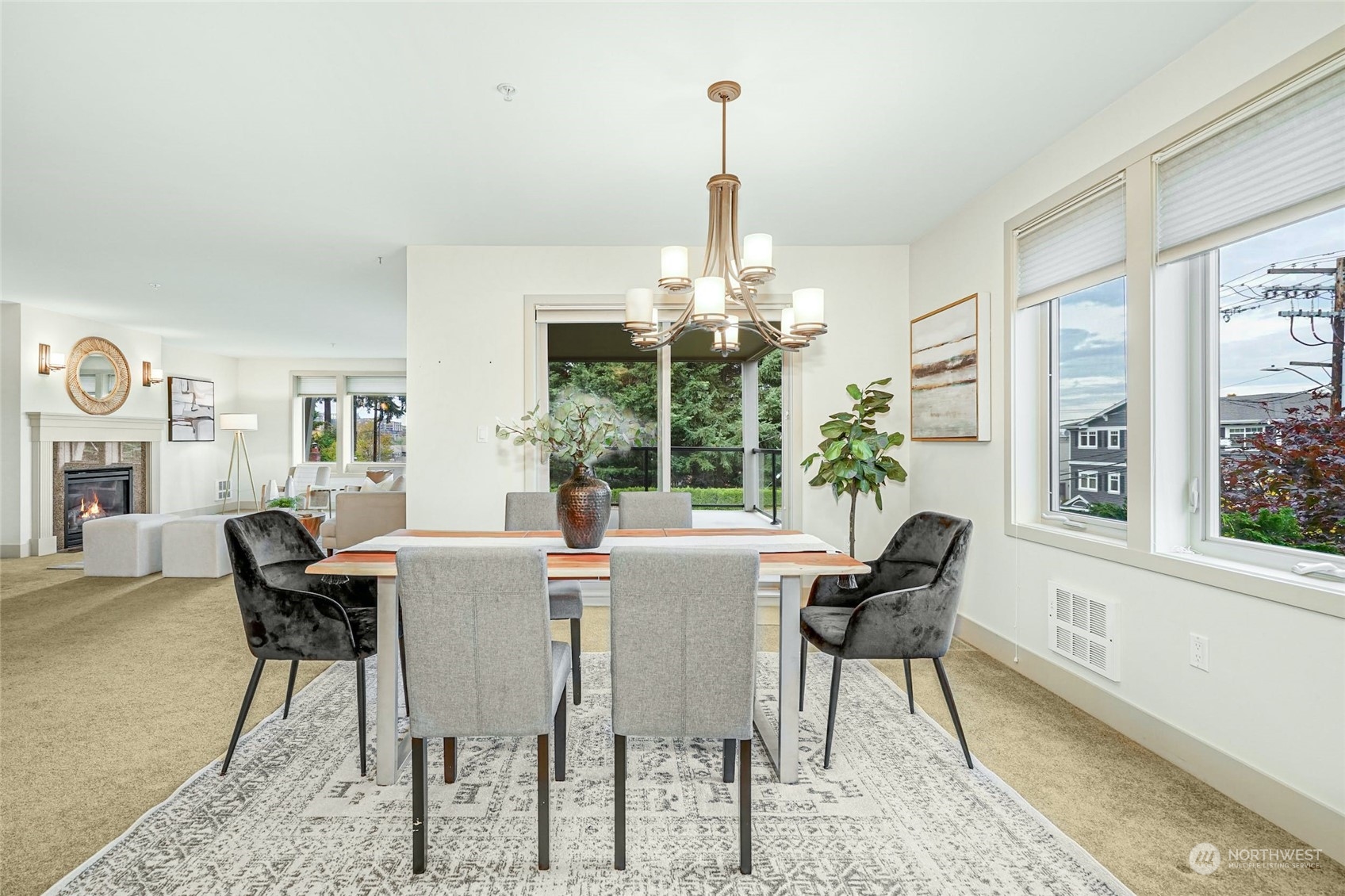 316 Walnut Street, Unit 201 Edmonds, WA 98020 - Photo 9 of 29 a view of a dining room with furniture wooden floor and chandelier