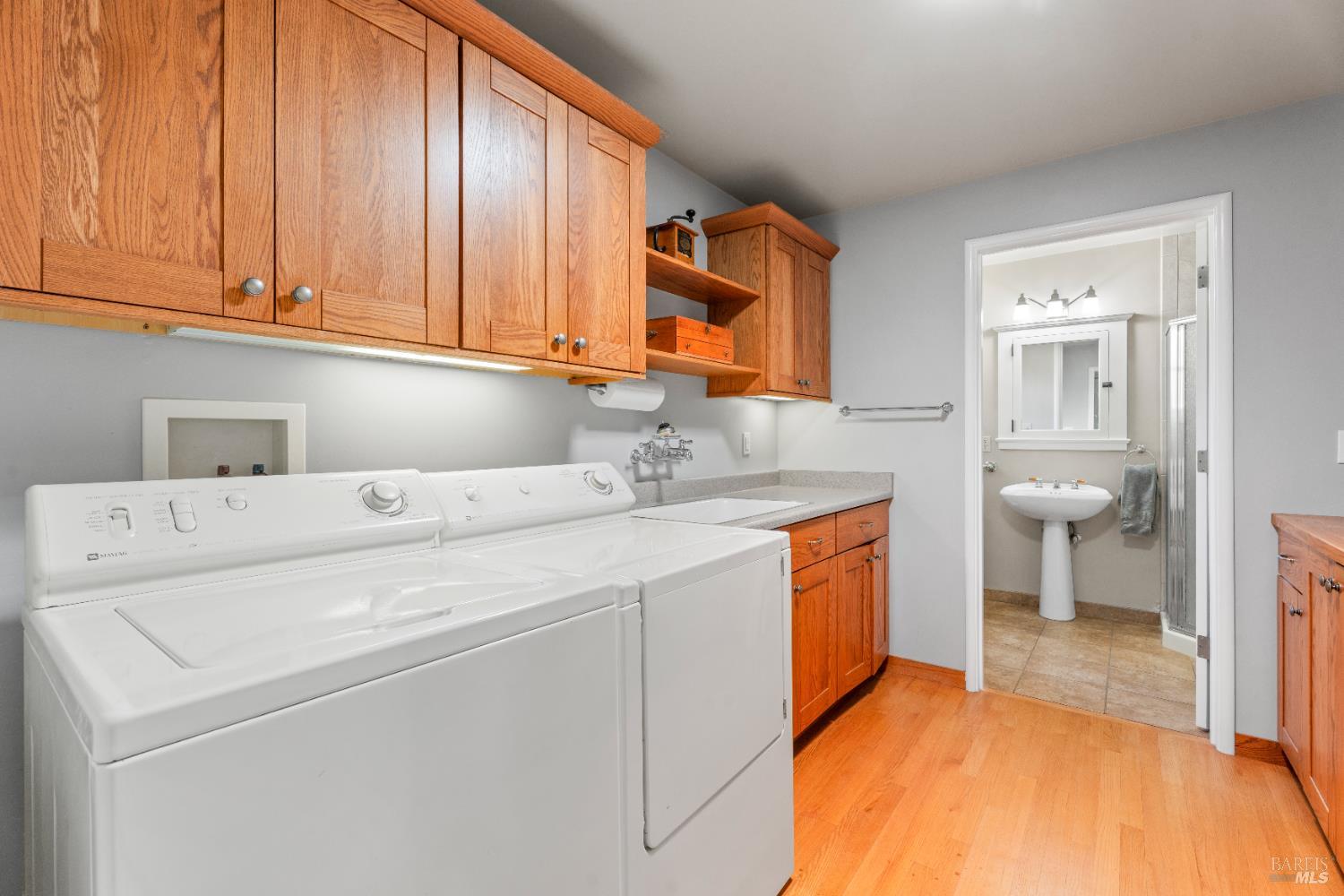 7420 Eastside Potter Valley Road Ukiah, CA 95482 - Photo 21 of 47 Laundry room with additional pantry storage.