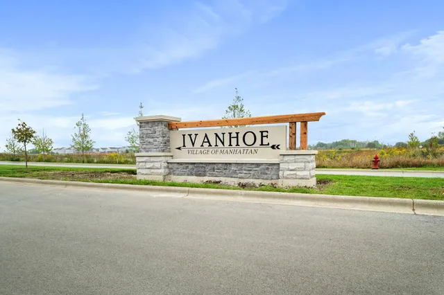 a street sign on the side of building