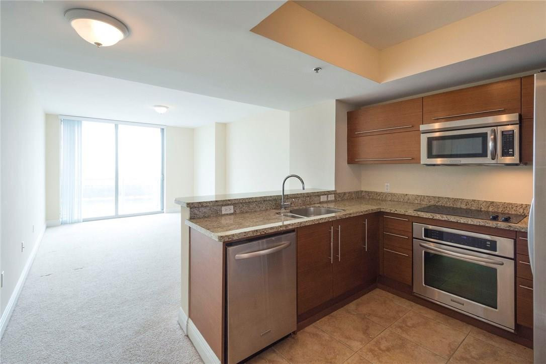 2681 North Flamingo Road, Unit S902 Sunrise, FL 33323 - Photo 18 of 29 Kitchen looking into living room