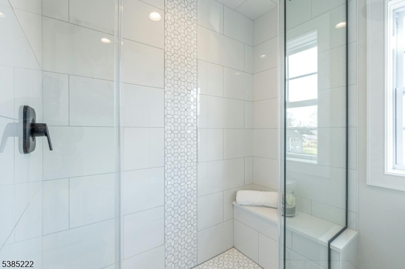 484 4th Avenue, Unit 9 Garwood, NJ 07027 - Photo 20 of 28 a bathroom with a shower and toilet