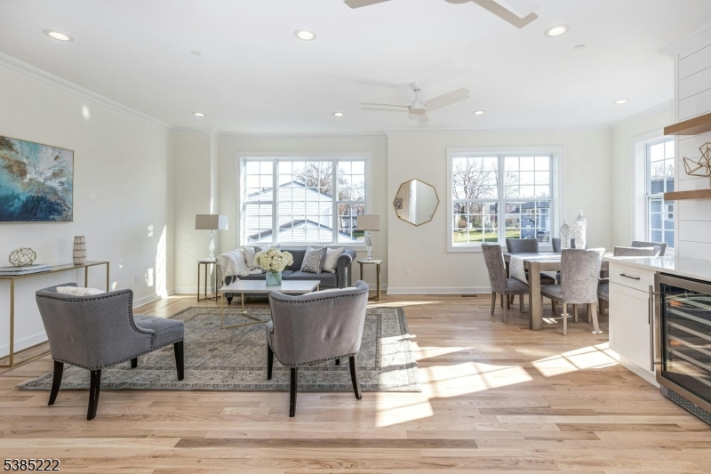 484 4th Avenue, Unit 9 Garwood, NJ 07027 - Photo 2 of 28 a living room with fireplace furniture and a table