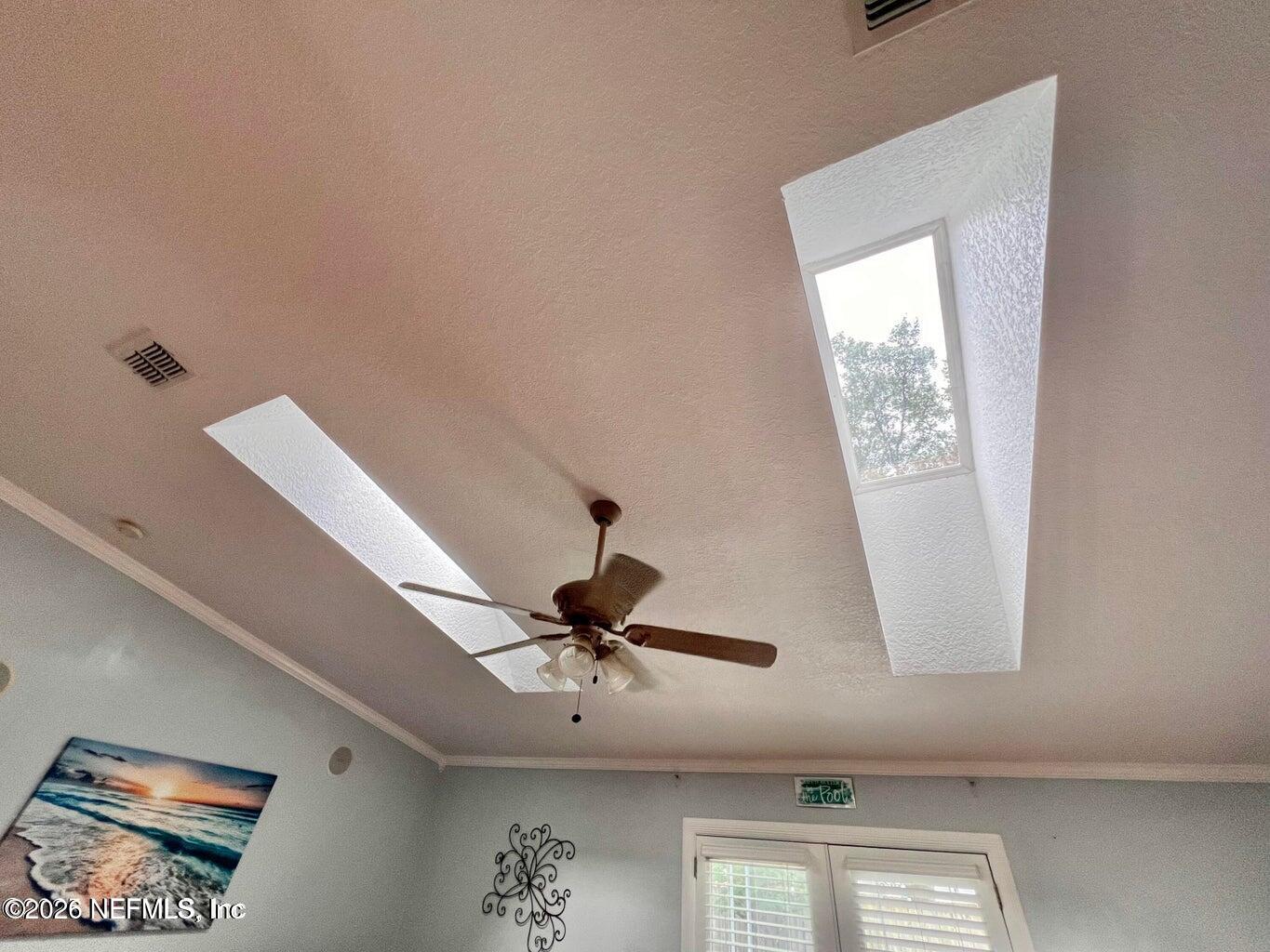 3419 Bristol Bridge Road Orange Park, FL 32073 - Photo 19 of 36 a view of room with a window and a ceiling fan