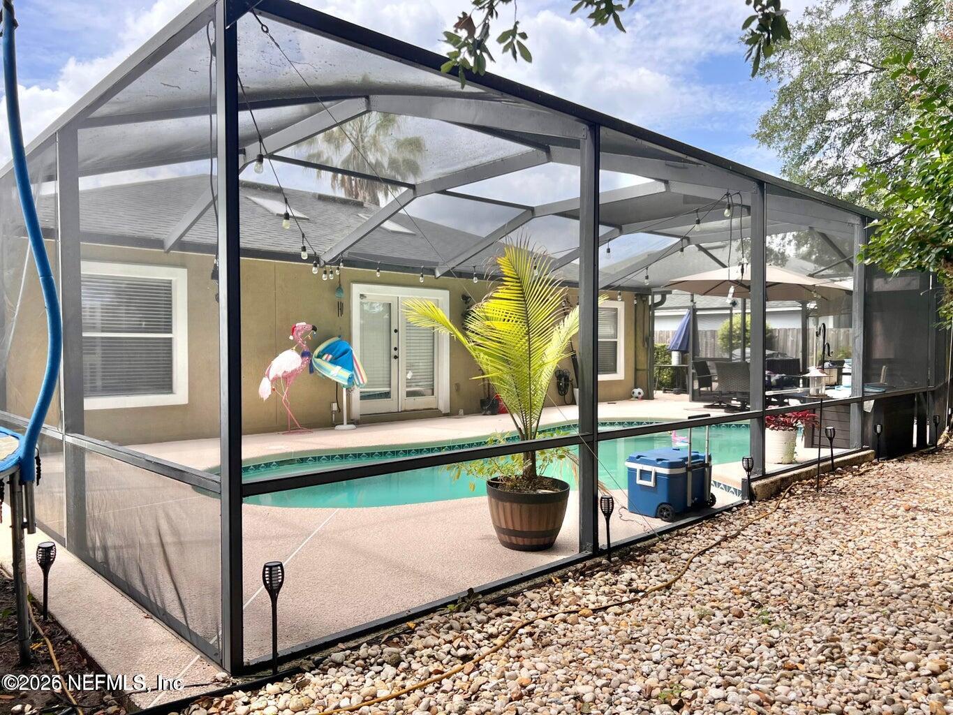 3419 Bristol Bridge Road Orange Park, FL 32073 - Photo 25 of 36 a view of a porch with furniture