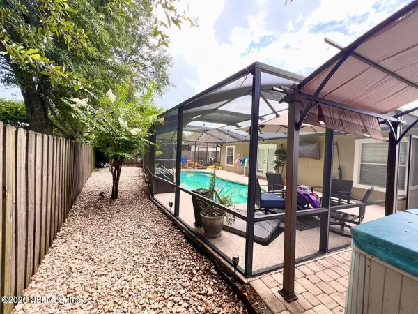 a view of a chairs and tables in the balcony