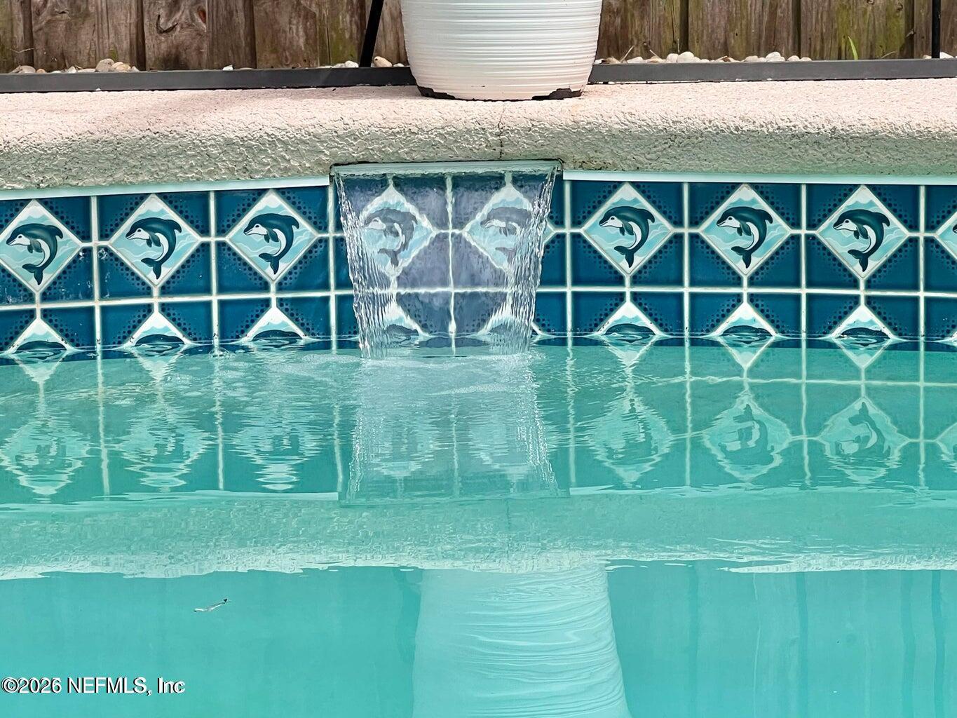 3419 Bristol Bridge Road Orange Park, FL 32073 - Photo 30 of 36 a backyard of a house