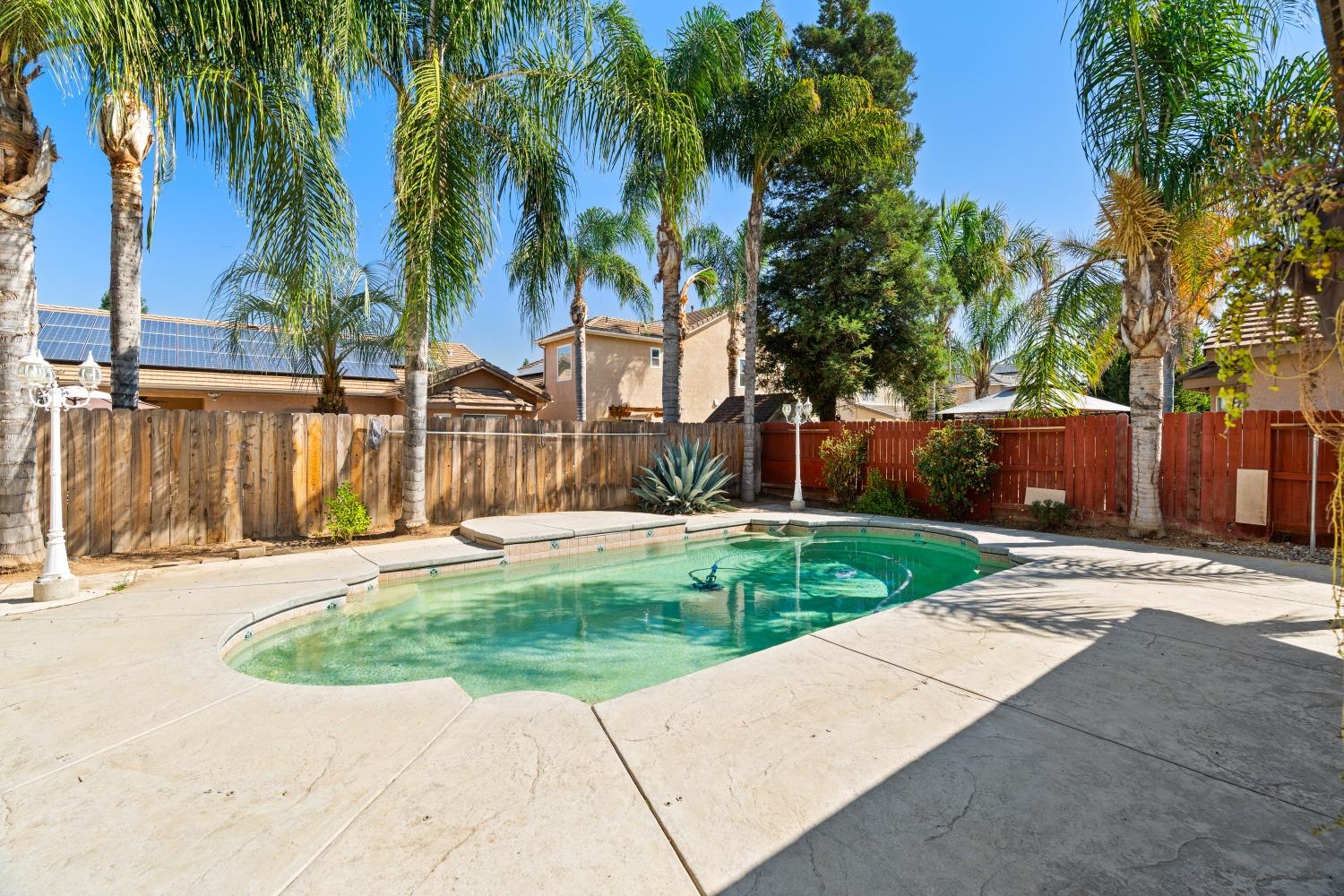 2763 Pico Avenue Clovis, CA 93611 - Photo 2 of 27 a garden view with palm trees