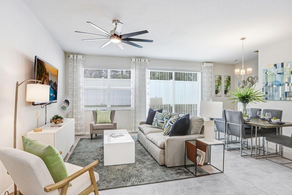 5349 Coldpine Place Seffner, FL 33584 - Photo 5 of 24 a living room with furniture and a window