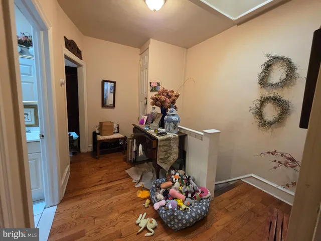 a front view of a building with outdoor seating