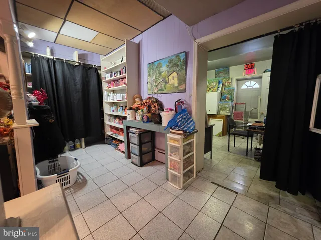 a view of a workspace with furniture