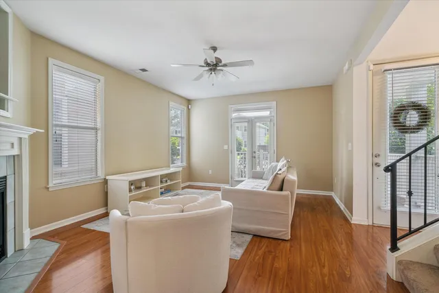 a living room with furniture and a table