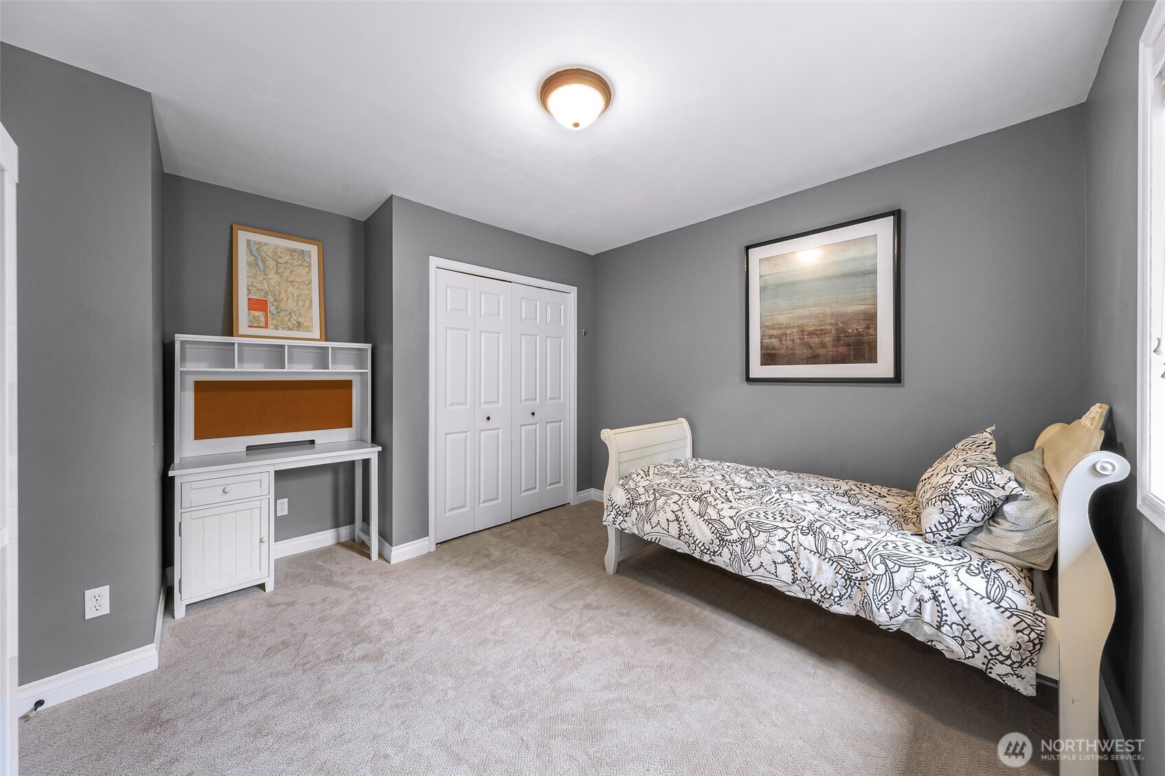 2029 240th Place Southeast Bothell, WA 98021 - Photo 26 of 39 a bedroom with a bed and a cabinets