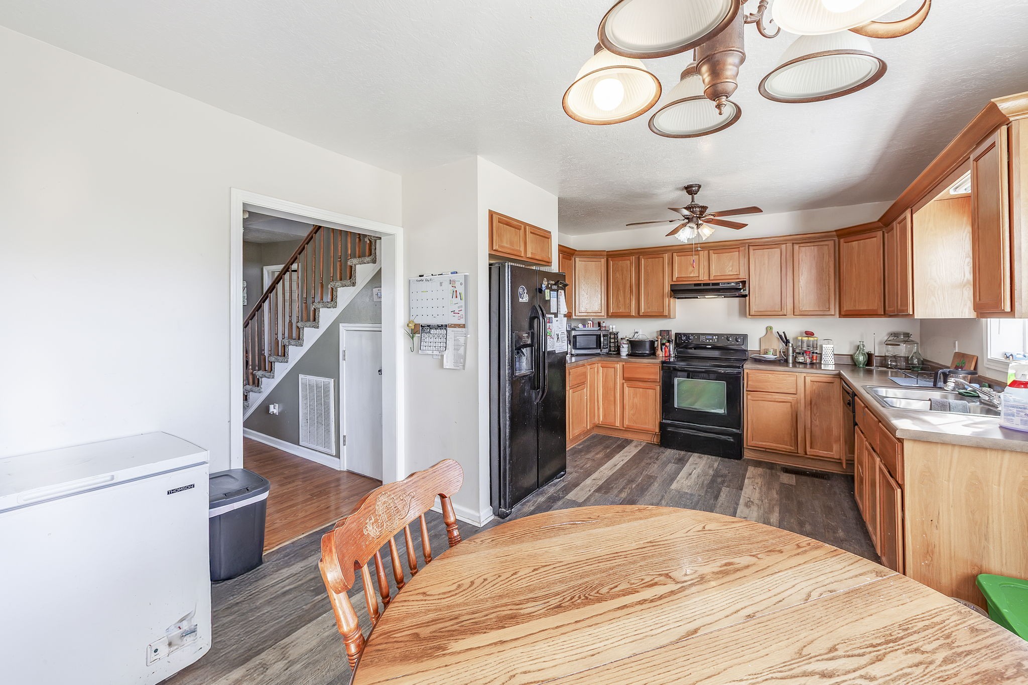 42 Jesse Patterson Road Trenton, TN 38382 - Photo 14 of 27 a kitchen with stainless steel appliances a refrigerator and a stove top oven