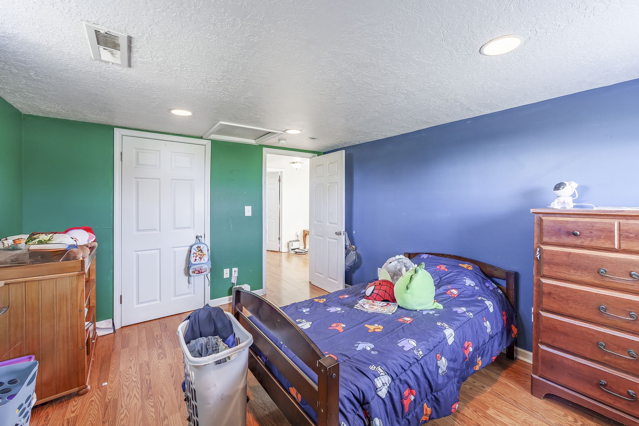 42 Jesse Patterson Road Trenton, TN 38382 - Photo 20 of 27 a bedroom with a bed and a dresser