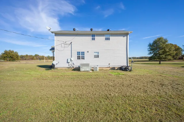 a view of a big room with table and chair