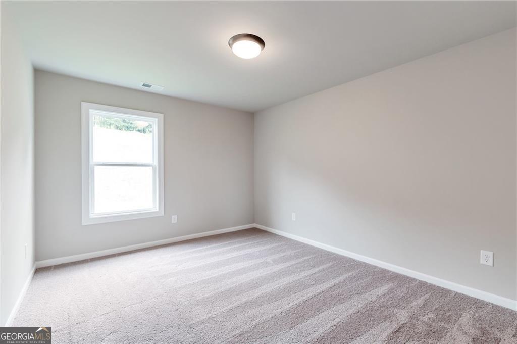 333 Willow Cove Canton, GA 30114 - Photo 15 of 37 an empty room with a window
