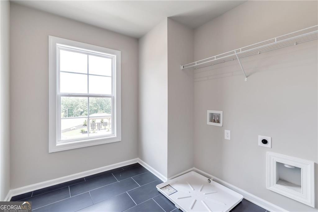333 Willow Cove Canton, GA 30114 - Photo 19 of 37 wooden floor in an empty room with a window