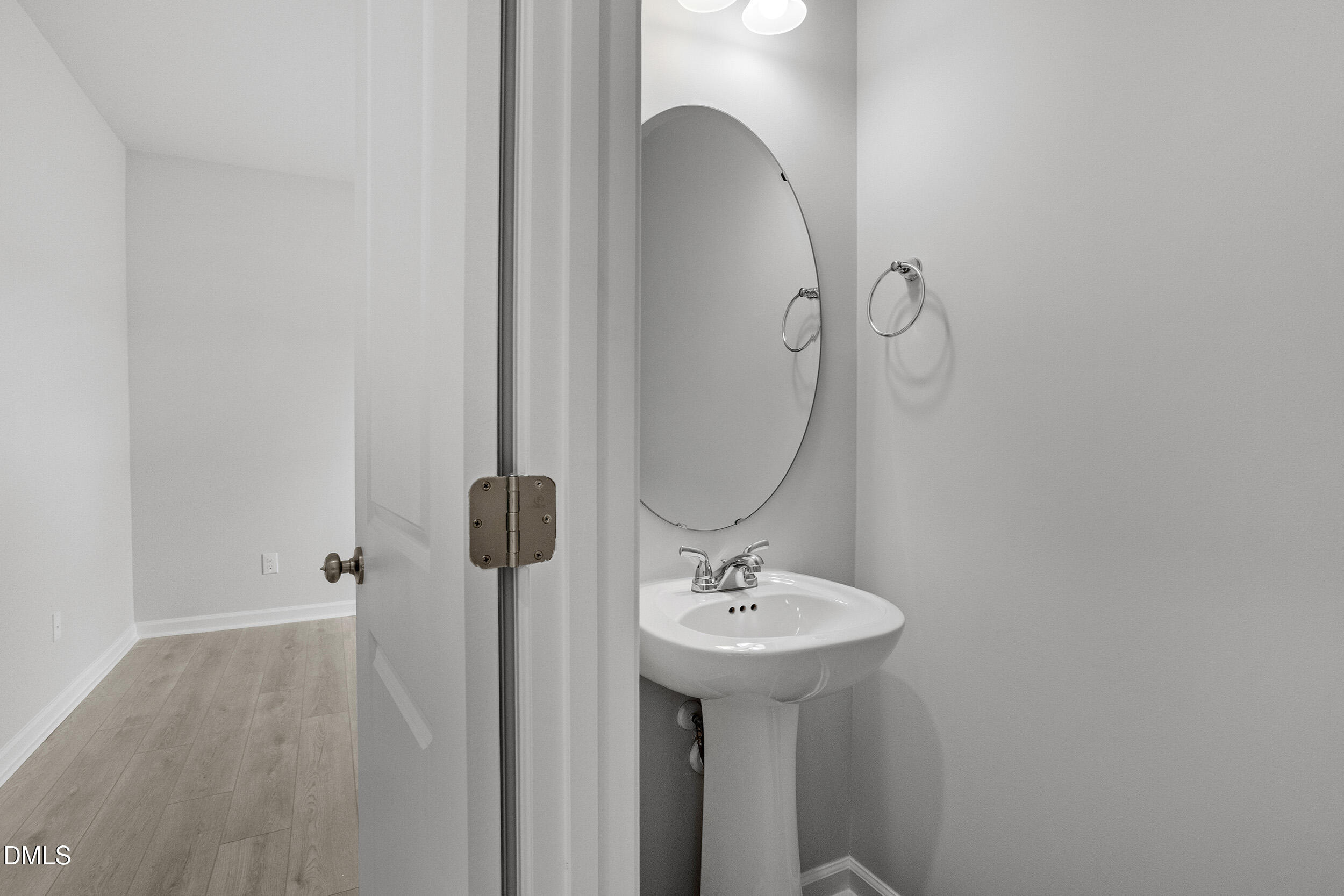 79 Osgood Street Angier, NC 27501 - Photo 16 of 31 a bathroom with a sink and mirror
