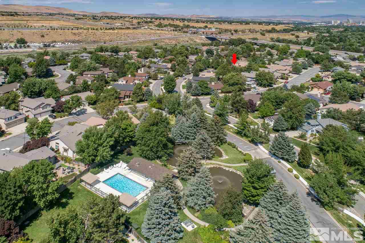 150 Edgewater Parkway Reno, NV 89519 - Photo 23 of 25 an aerial view of residential houses with outdoor space and trees