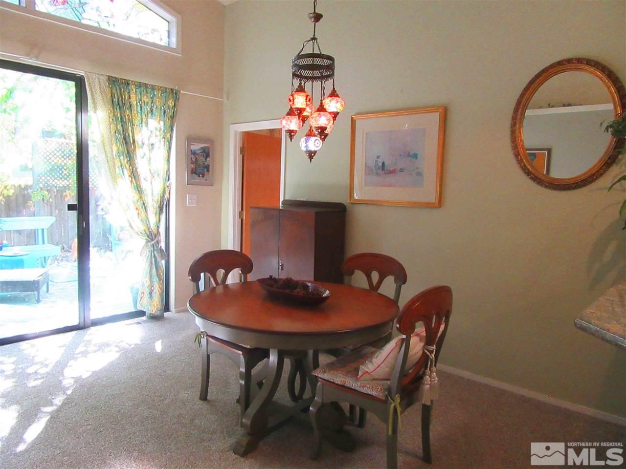 150 Edgewater Parkway Reno, NV 89519 - Photo 8 of 25 a dining room with furniture and window