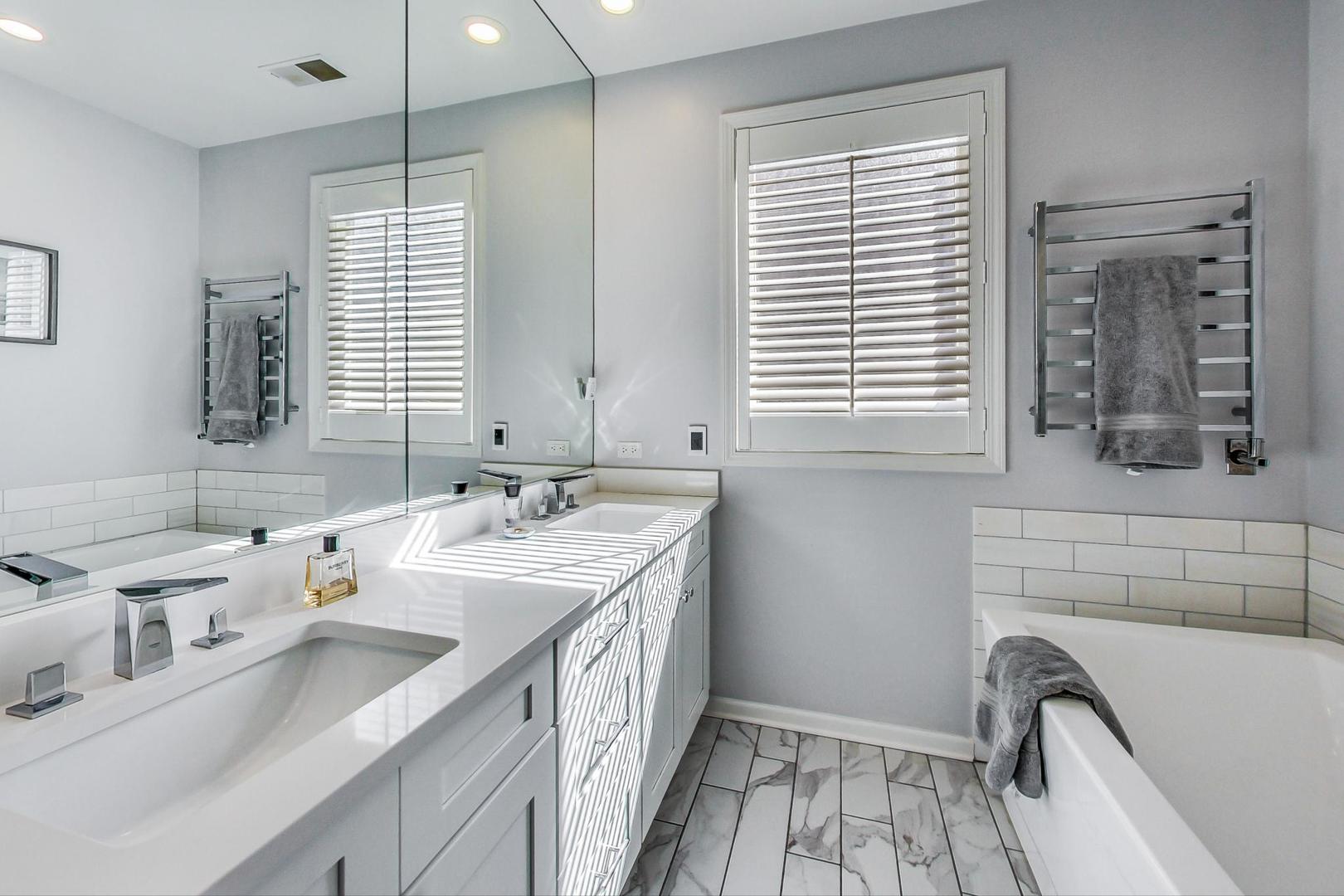 1351 West Altgeld Street, Unit 4D Chicago, IL 60614 - Photo 15 of 30 a bathroom with a sink and a window