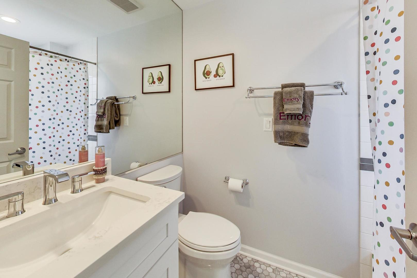 1351 West Altgeld Street, Unit 4D Chicago, IL 60614 - Photo 24 of 30 a bathroom with a sink toilet and shower