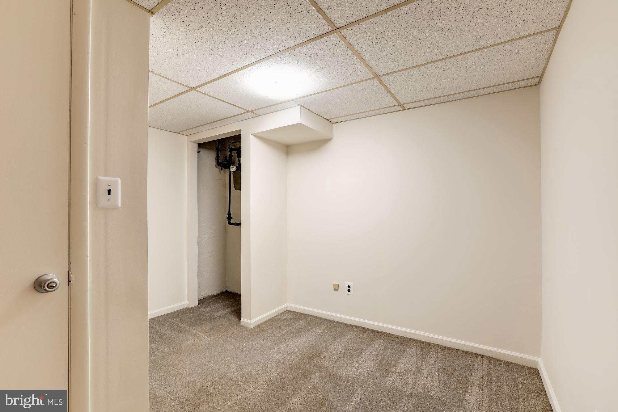 1703 Florin Street Silver Spring, MD 20902 - Photo 21 of 30 a view of a room with an empty space