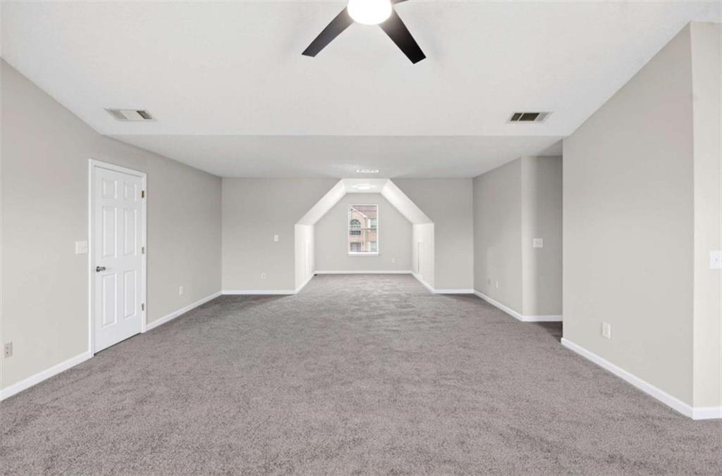 1727 Rice Square Lithonia, GA 30058 - Photo 19 of 33 a view of a livingroom with a ceiling fan