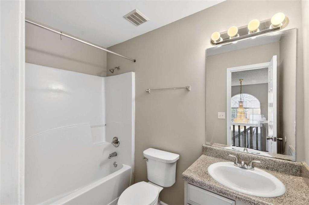 1727 Rice Square Lithonia, GA 30058 - Photo 27 of 33 a bathroom with a sink toilet tub and shower