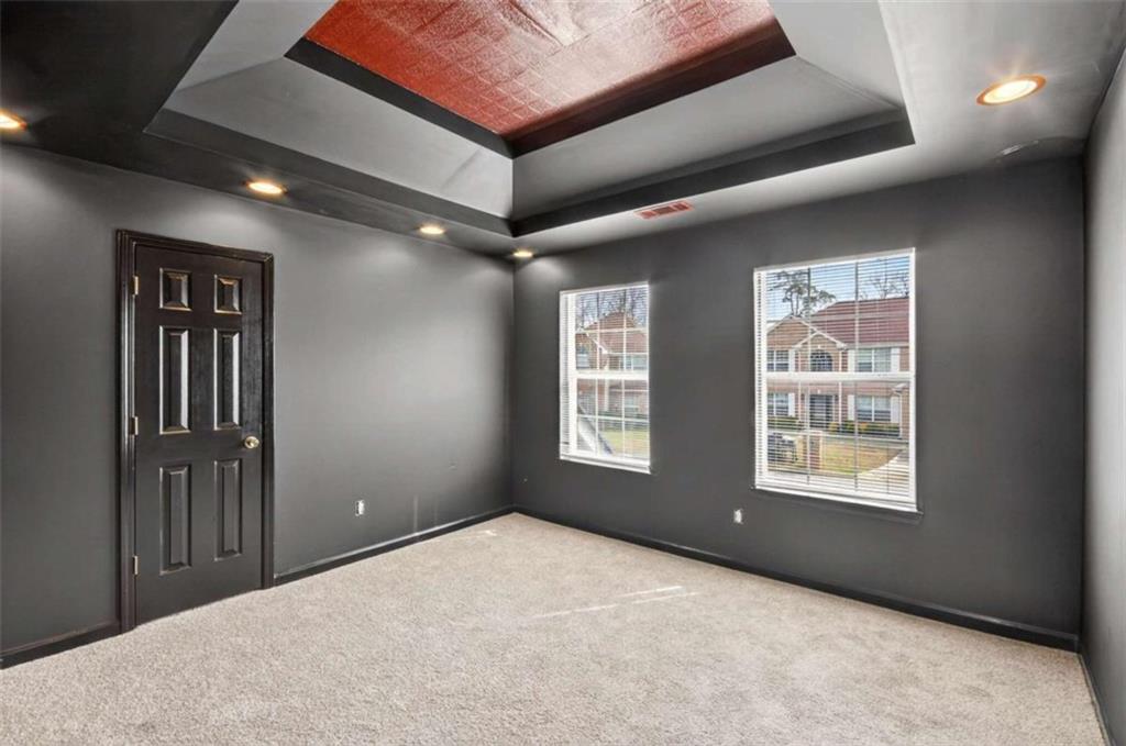 1727 Rice Square Lithonia, GA 30058 - Photo 28 of 33 a view of an empty room and window