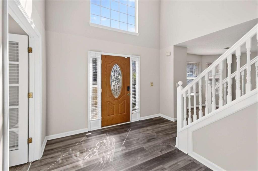 1727 Rice Square Lithonia, GA 30058 - Photo 4 of 33 a view of an entryway with wooden floor