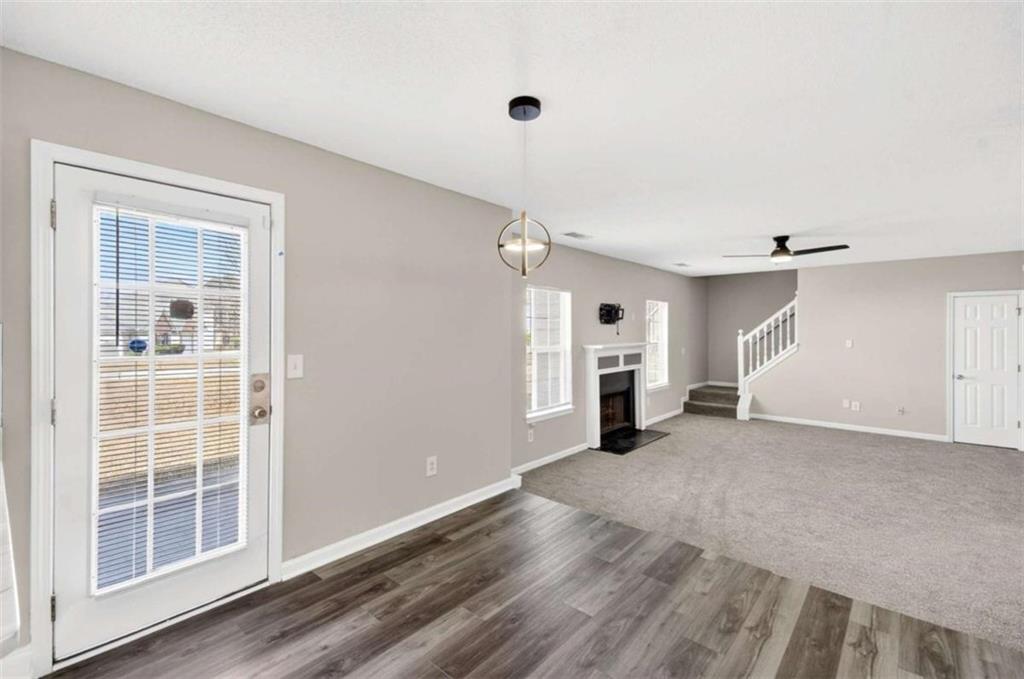 1727 Rice Square Lithonia, GA 30058 - Photo 8 of 33 an empty room with windows and closet